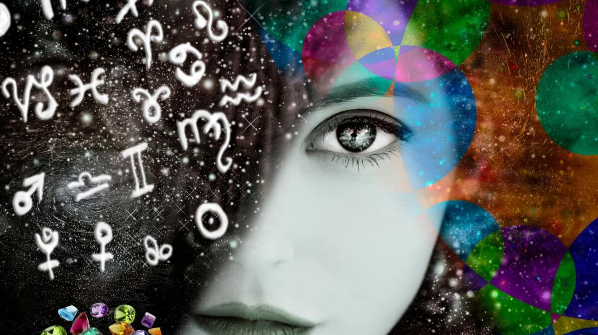 Multi colored Sapphire gemstones with zodiac symbols, featuring a mystical design.