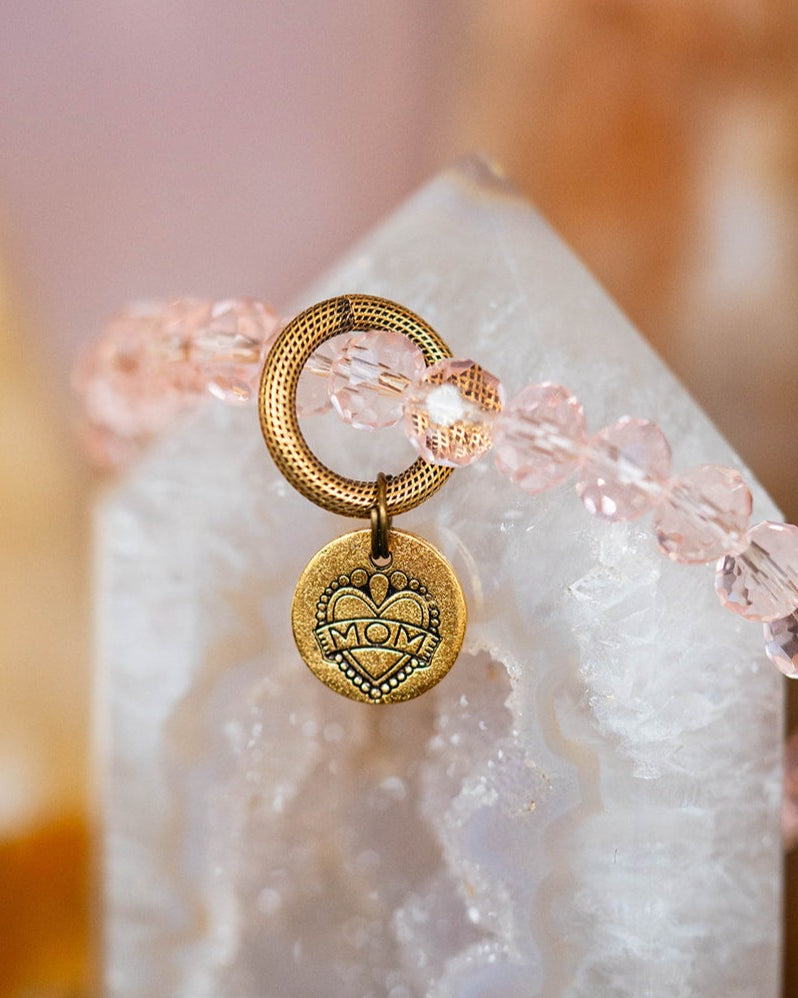 "Mom" Bracelet Featuring Katie Tattoos and Heifer International Bella Vita Jewelry Pink