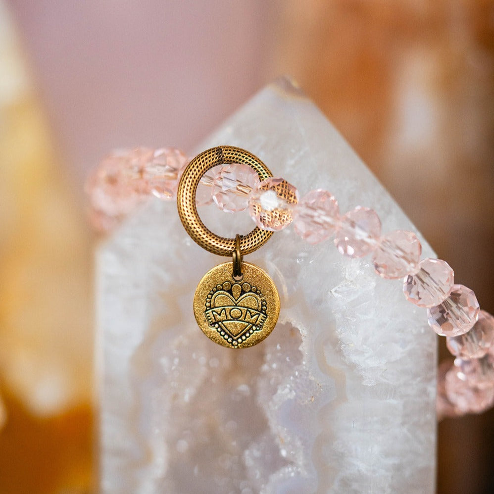 "Mom" Bracelet Featuring Katie Tattoos and Heifer International  Bella Vita Jewelry Pink