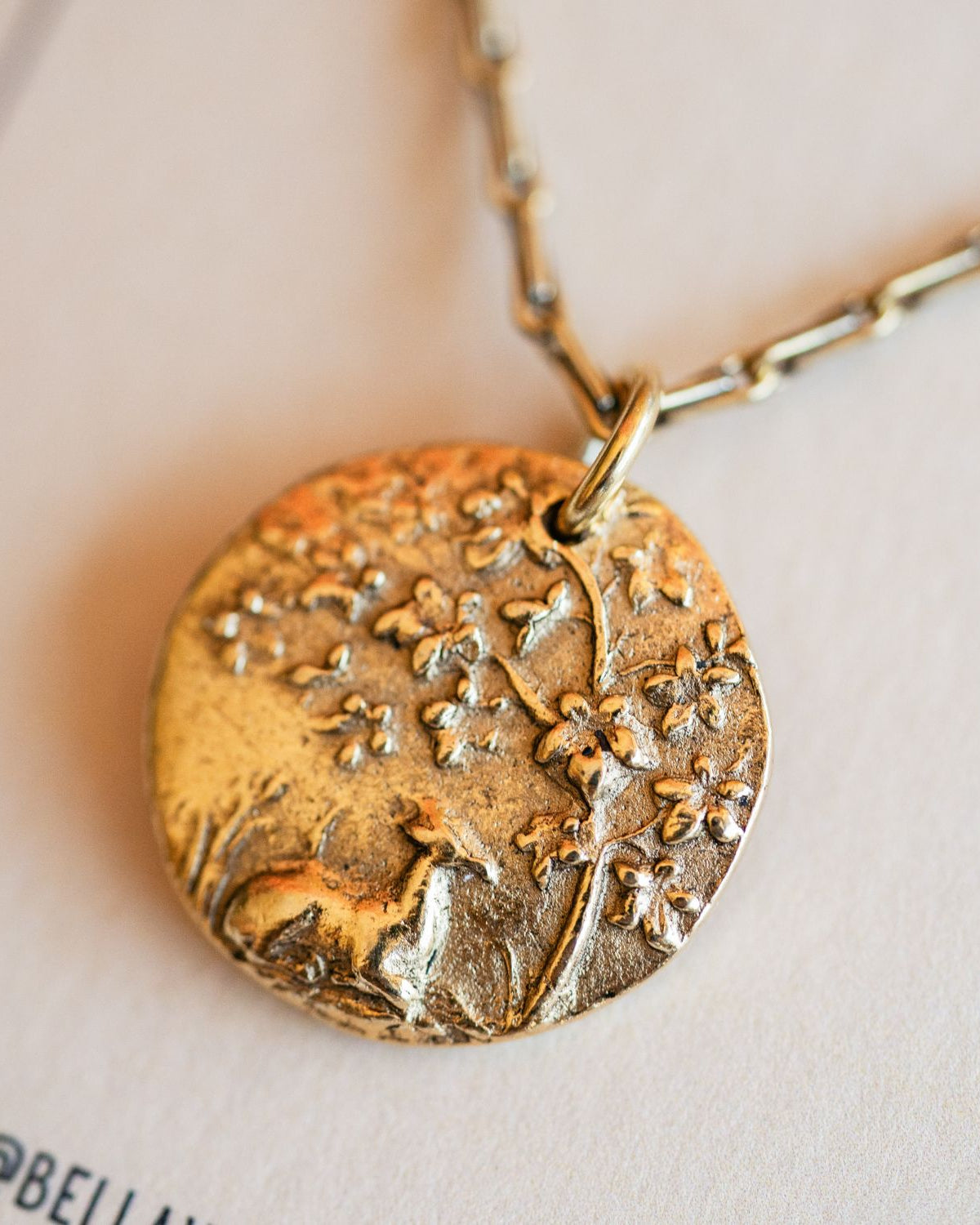 Cast gold fawn pendant from antique woodland button design by Bella Vita Jewelry