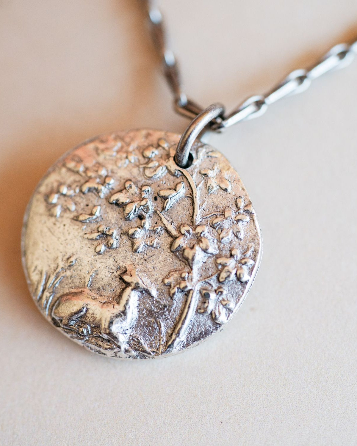 Artisan silver fawn pendant necklace featuring vintage deer button casting by Bella Vita