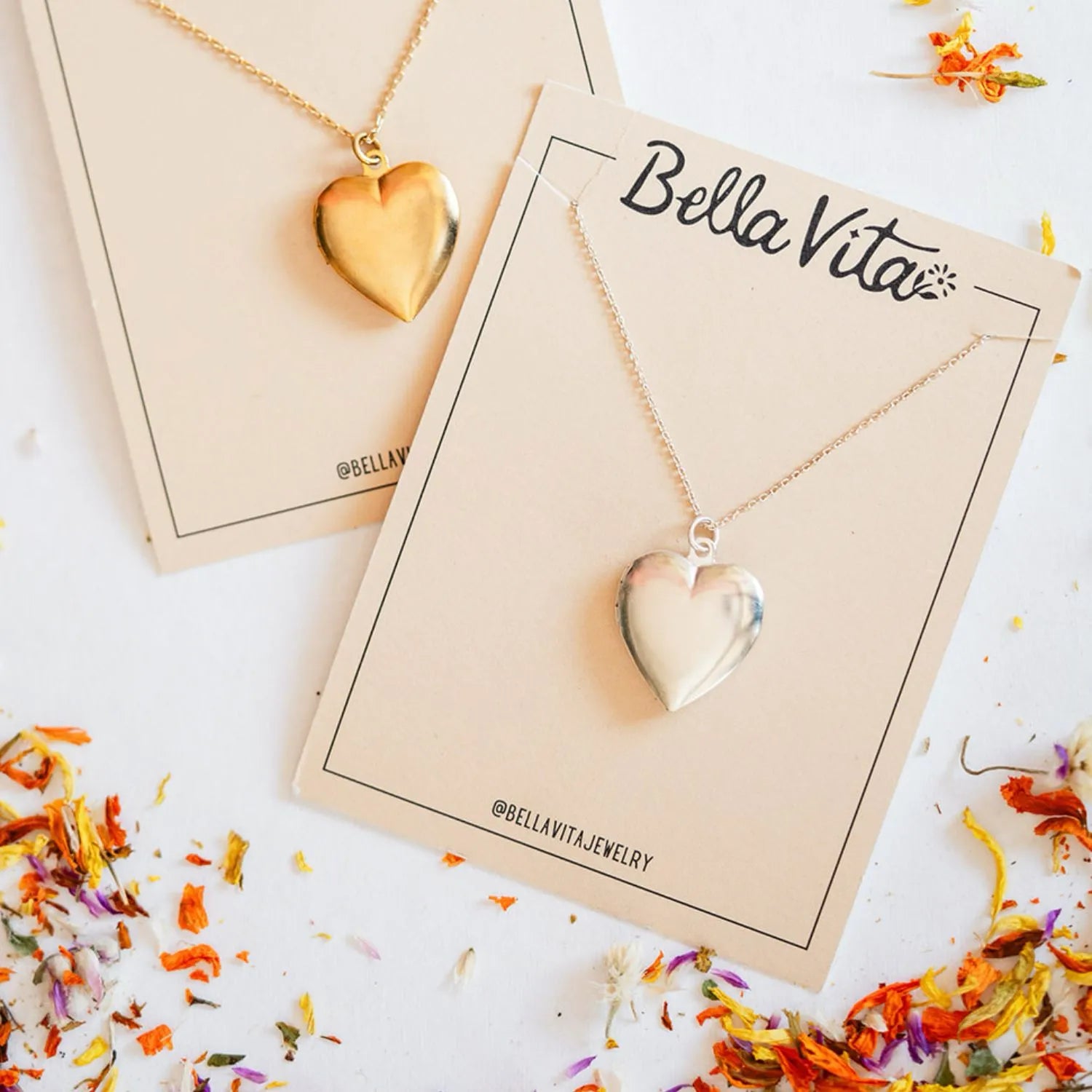 Delicate gold heart pendant necklaces from Bella Vita Jewelry displayed on cream cardstock, handcrafted in our Little Rock studio using 14k gold fill for meaningful everyday wear.