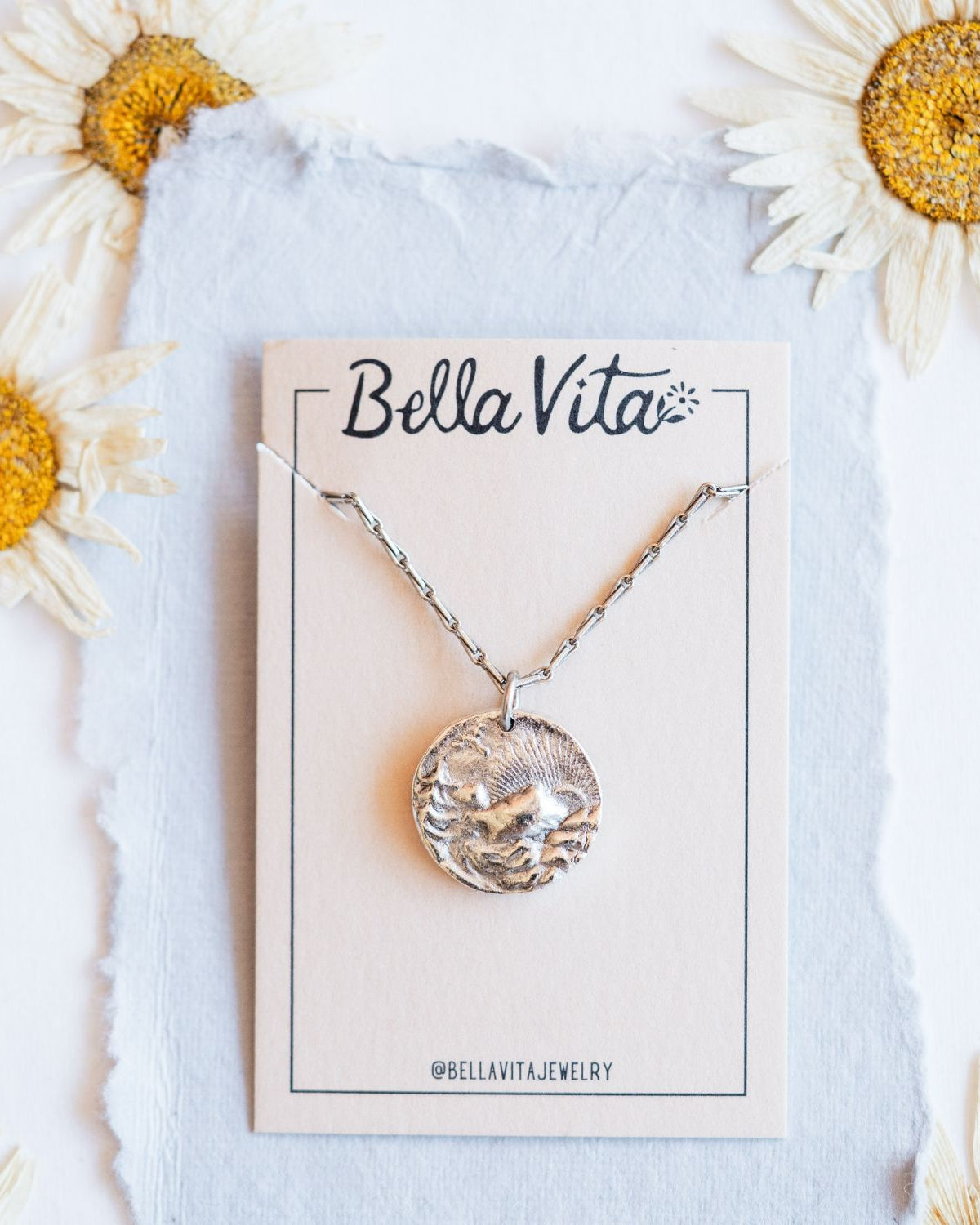 Silver cast mountain sunset heirloom pendant with Bella Vita artisan jewelry packaging