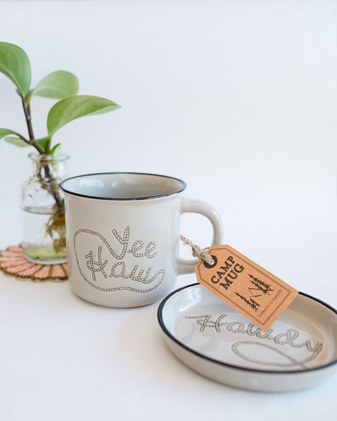 White mug with gray 'YeeHaw' text, matching coaster and rustic tag