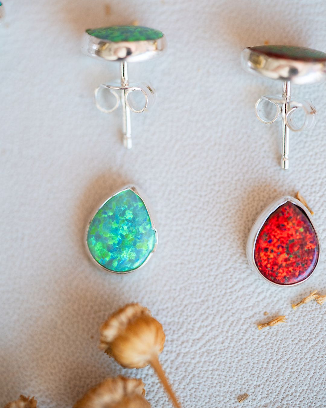 Green Summer and red Fall sterling silver opal studs displayed together
