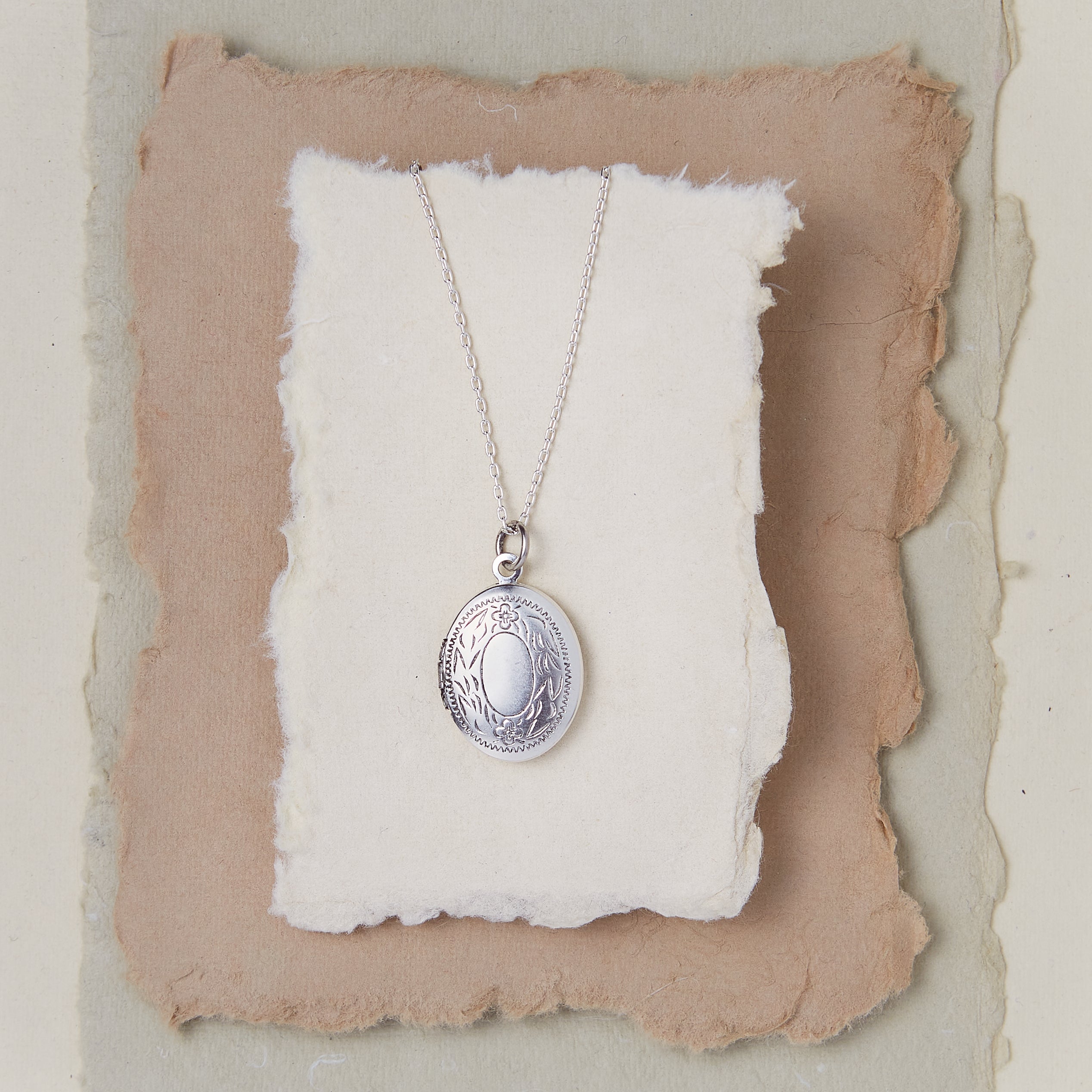 Oval Locket With Leaf Border Locket Necklaces Bella Vita Jewelry Silver Plated