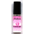 Ambrosia alcohol-free perfume oil by The Incense Sampler in glass roll-on vial with pink label, featuring traditional concentrated fragrance from India.