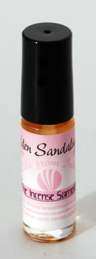 Golden Sandalwood natural perfume oil from The Incense Sampler in roll-on glass vial, featuring concentrated Indian fragrance without alcohol.