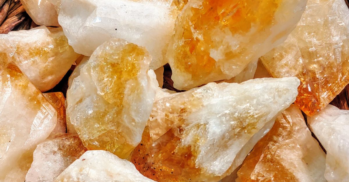 Raw citrine stones with natural textures and warm colors, highlighting the organic beauty of the November birthstone