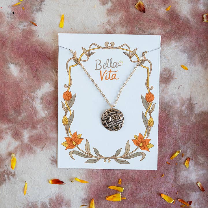 Art Nouveau bronze flower necklace on custom Bella Vita card with floral border design. Unique handcrafted jewelry for gift giving or personal style.