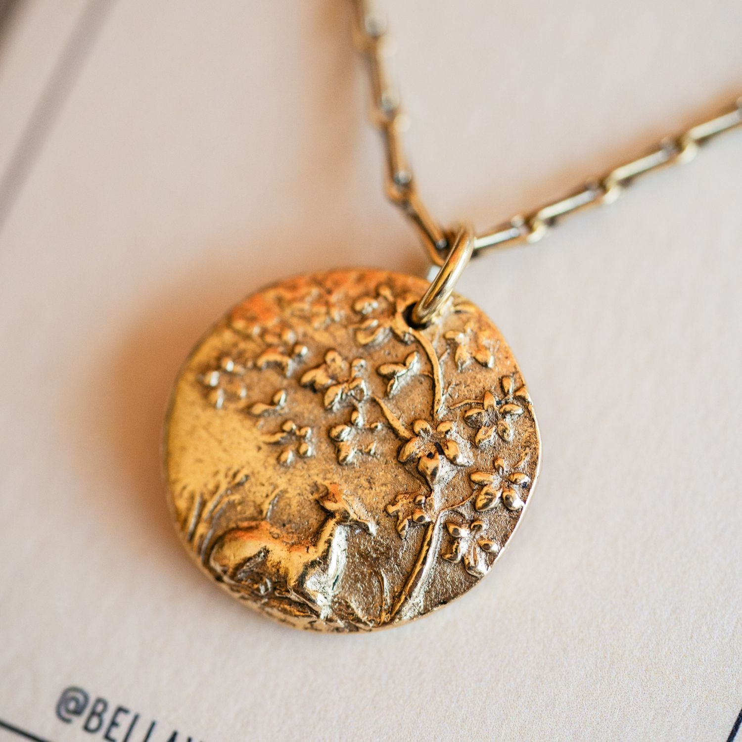 Cast gold fawn pendant from antique woodland button design by Bella Vita Jewelry