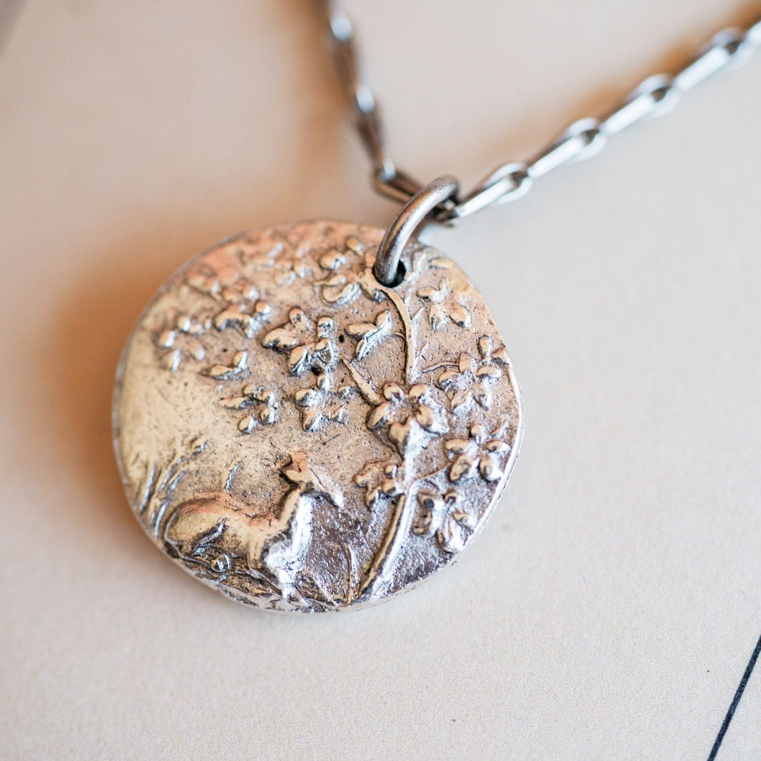 Artisan silver fawn pendant necklace featuring vintage deer button casting by Bella Vita