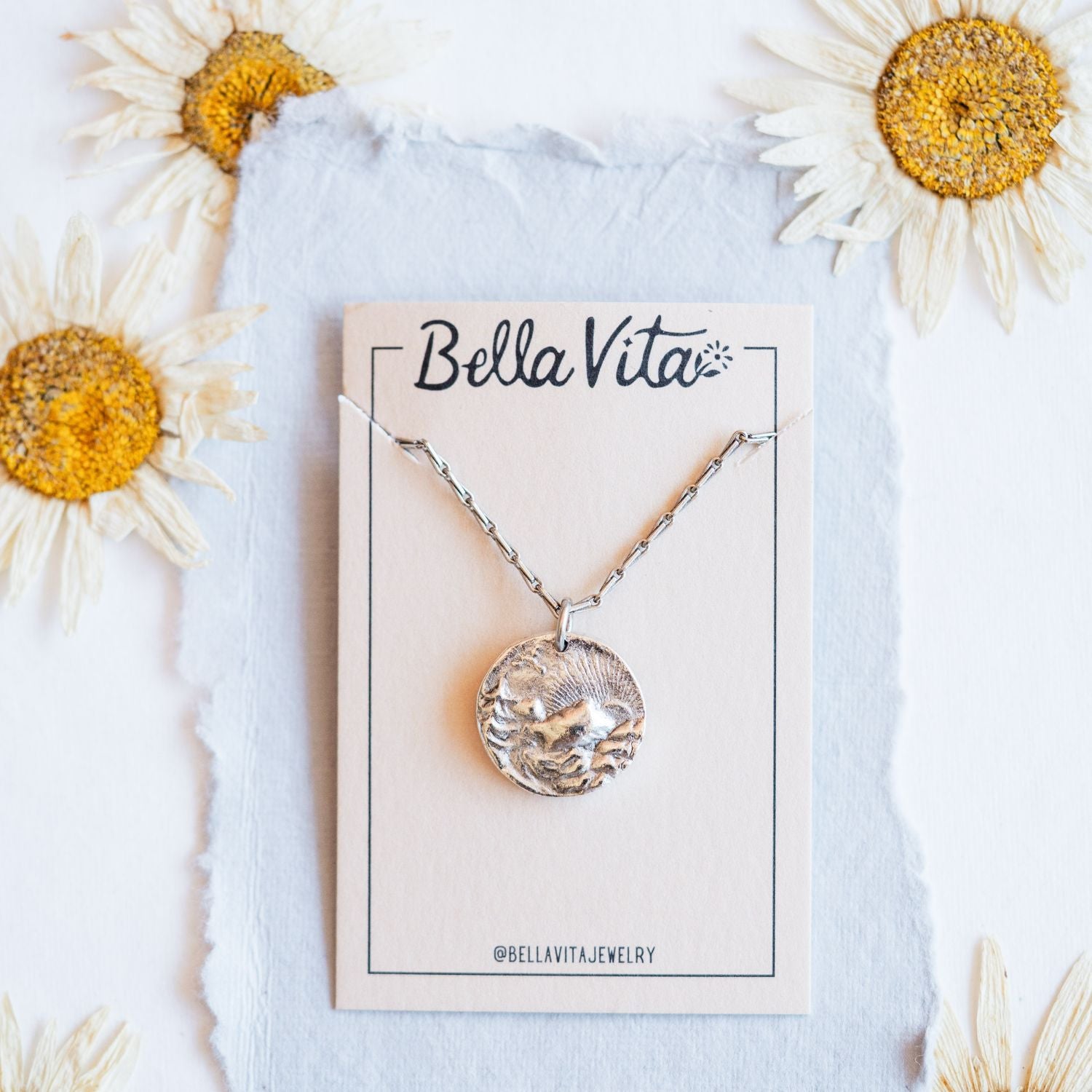 Silver cast mountain sunset heirloom pendant with Bella Vita artisan jewelry packaging