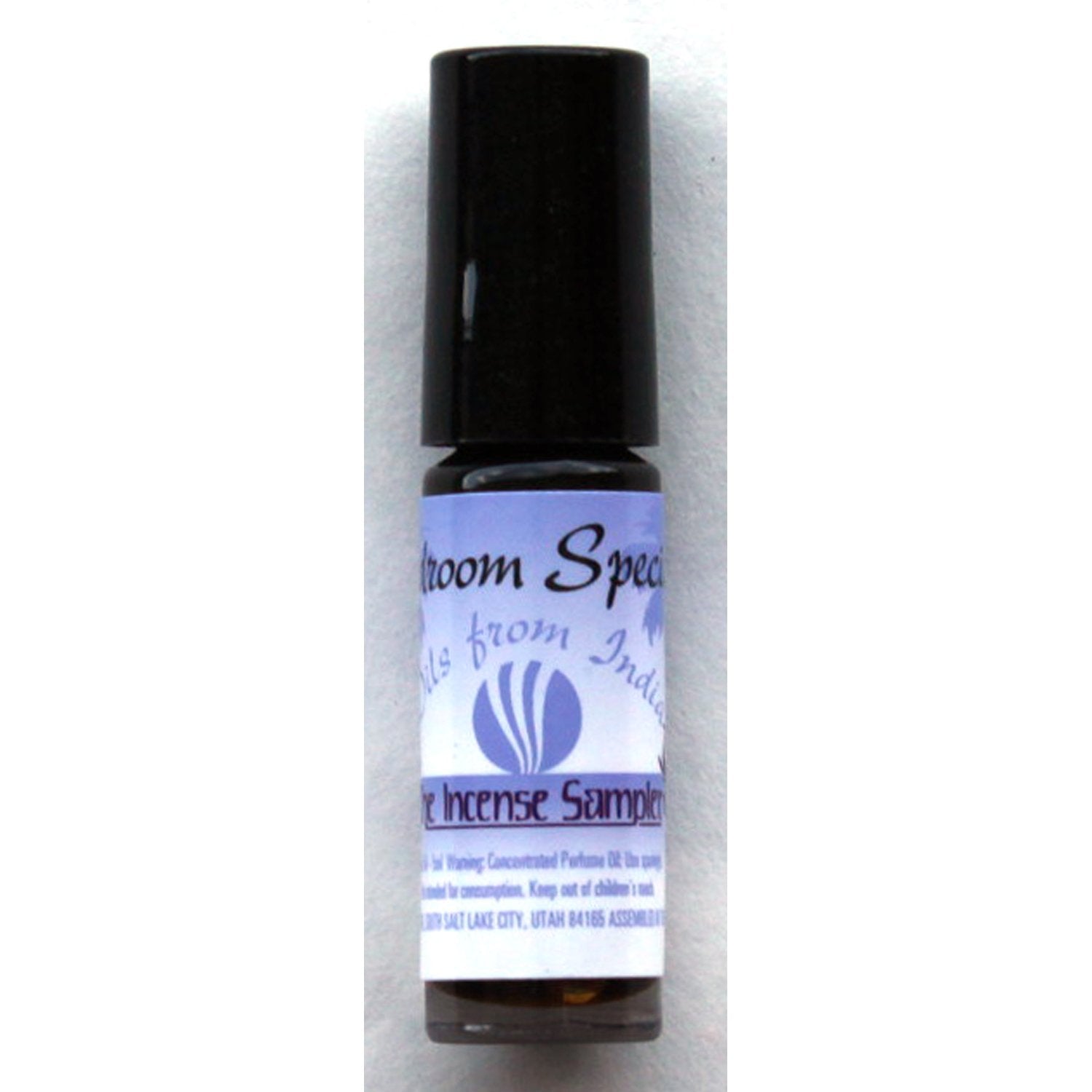 Bedroom Special exotic perfume oil from The Incense Sampler in concentrated roll-on vial with lavender label, featuring oils from India.