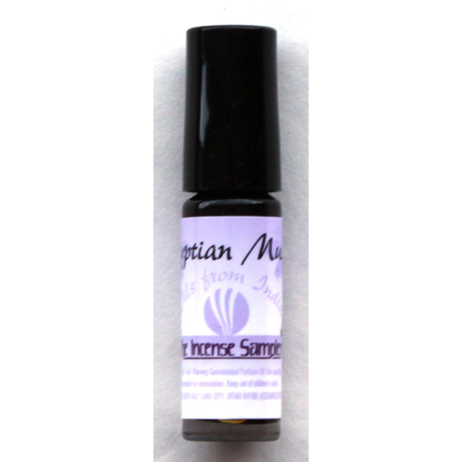 Egyptian Musk perfume oil concentrate by The Incense Sampler in portable roll-on vial with purple label, featuring exotic oils from India.