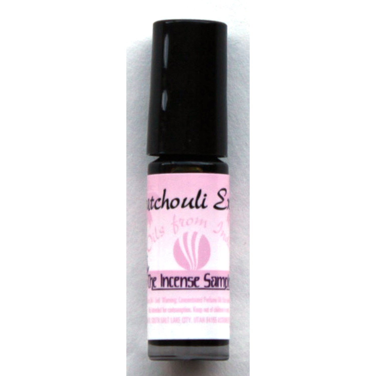 The Incense Sampler Patchouli Extra perfume oil from India in glass roll-on vial with pink label, concentrated formula for long-lasting wear.